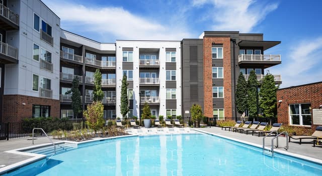 The Leila Everly - An upcoming Gainesville community featuring a resort-style pool, modern chef-inspired kitchens, a fully equipped fitness center, and inviting resident lounges.